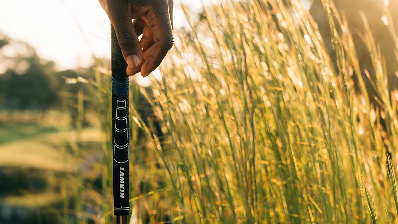 Sonar+ grip from Lamkin set against tall marsh grass